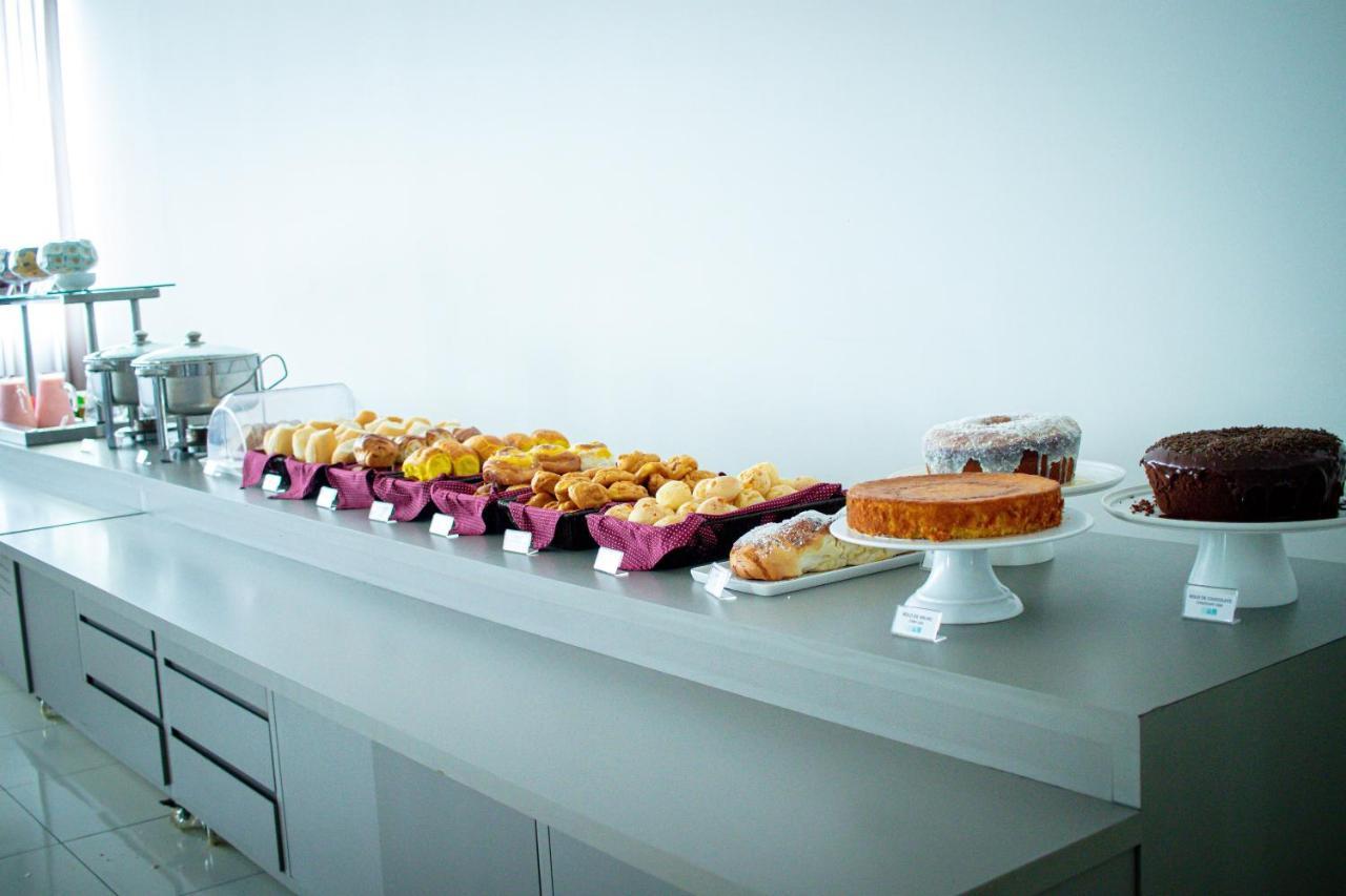 Hotel H2 Congonhas Congonhas  Eksteriør bilde A selection of cakes